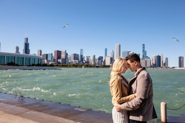 engaged couple poses for a photo at museum campus chicago