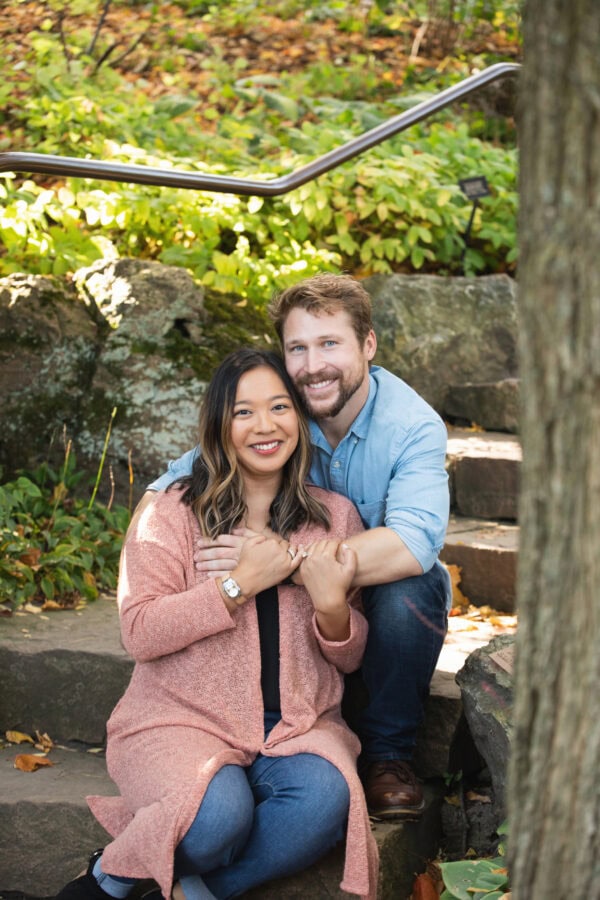 engaged couple poses for a photo at chicago botanic gardens