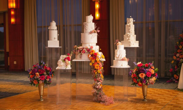 an extravagant cake installation on the dancefloor at a wedding