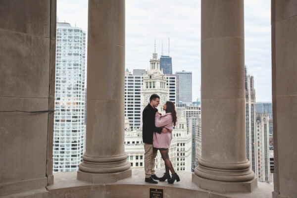 engaged couple poses for a photo at the londonhouse chicago