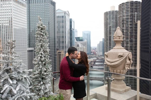 engaged couple poses for a photo at the londonhouse chicago